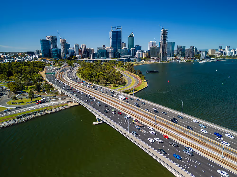 City skyline and highway show property development in Australia.