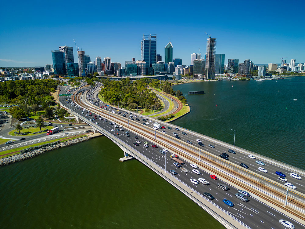 City skyline and highway show property development in Australia.