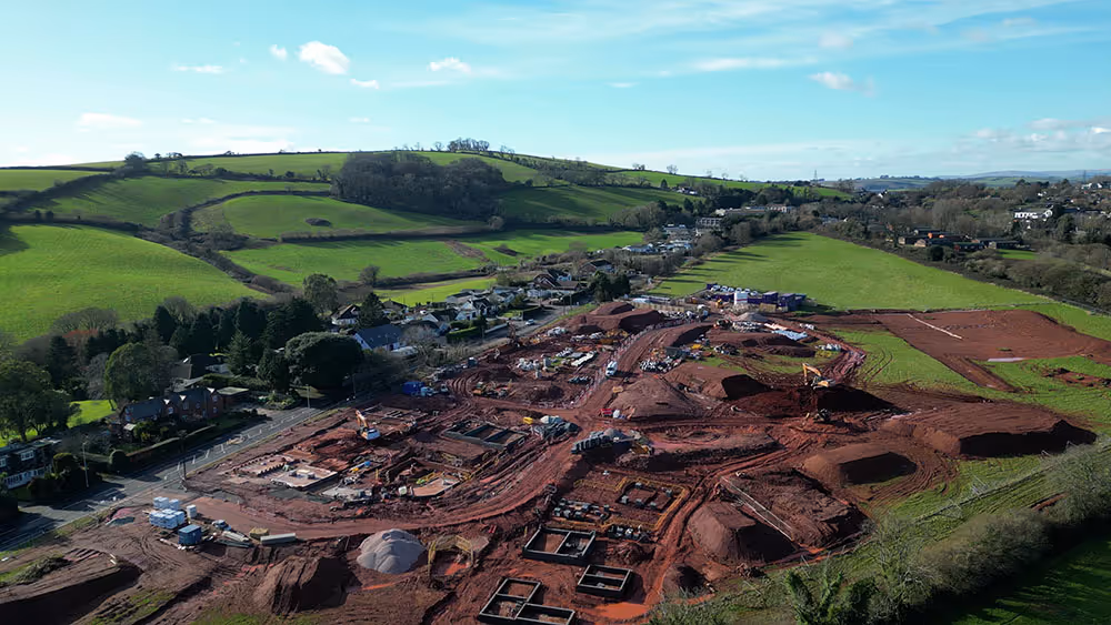 Large rural property development project management site under construction.