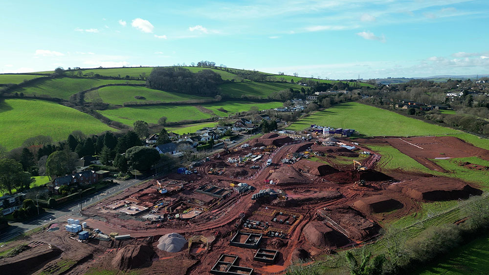 Large rural property development project management site under construction.