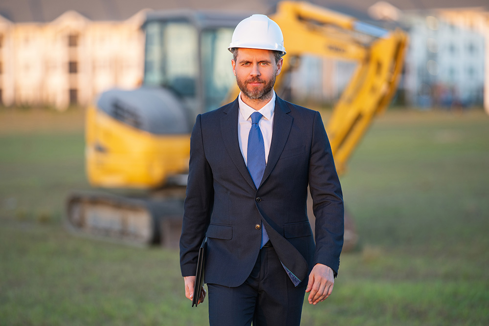 Man on site showing skills needed for how to get into property development