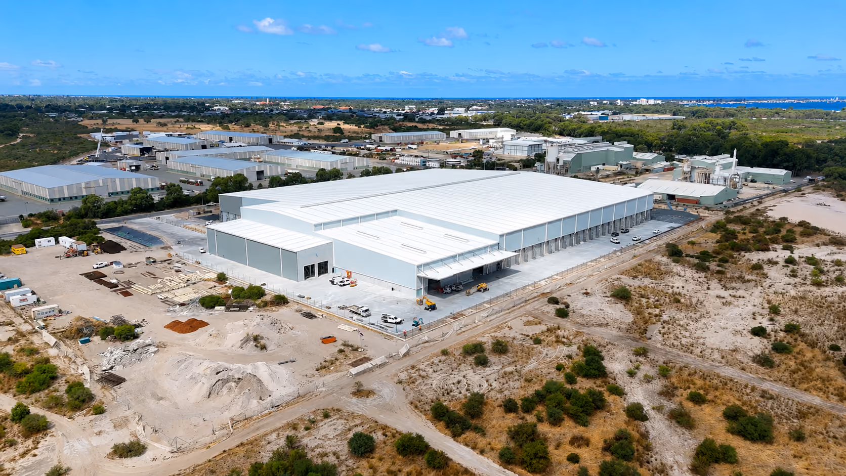 Aerial view of the Nutrien Ag Solutions Birchmead facility in East Rockingham, WA, with the large manufacturing building nearing completion.