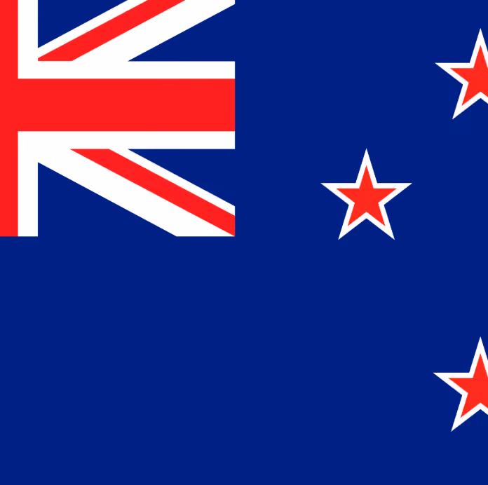 The New Zealand flag with a blue field, Union Jack in the corner, and four red stars with white borders.