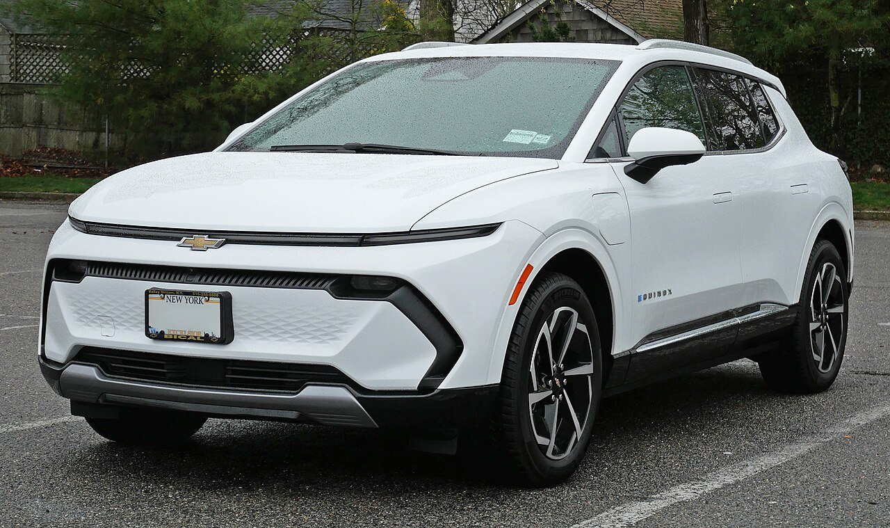 A 2026 Chevrolet Equinox EV in white, three-quarter front view.
