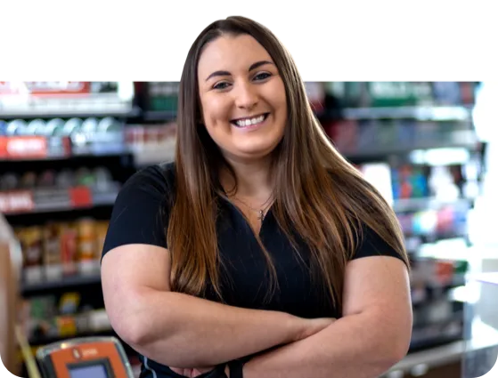 c-express woman employee smiling with arms crossed