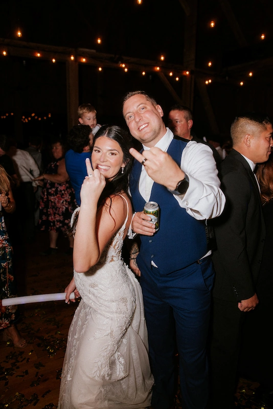 Bride dancing with guests at the wedding reception