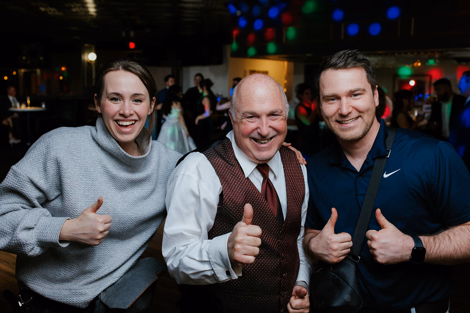Devan and Kaleigh of Heirloom Digital Productions with the DJ in the wedding photo booth