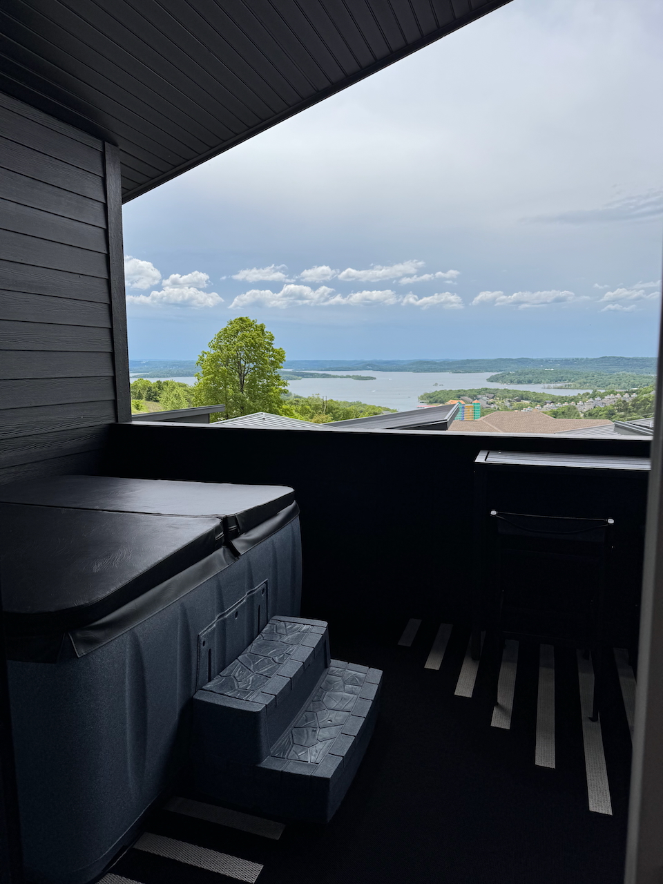 Nest Suite at Grotto Resort, a treehouse-style retreat set above the hillside with a private hot tub and Table Rock Lake views