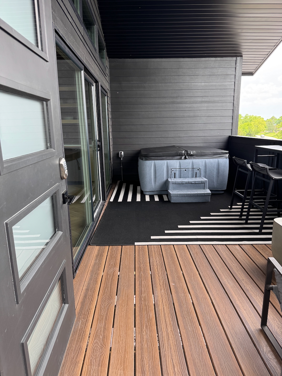 Nest Suite at Grotto Resort, a treehouse-style retreat set above the hillside with a private hot tub and Table Rock Lake views