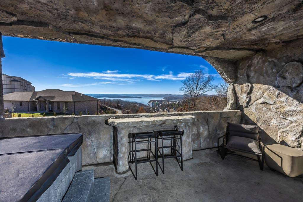 Cavern Suite at Grotto Resort, built into the natural stone hillside with a private veranda overlooking Table Rock Lake