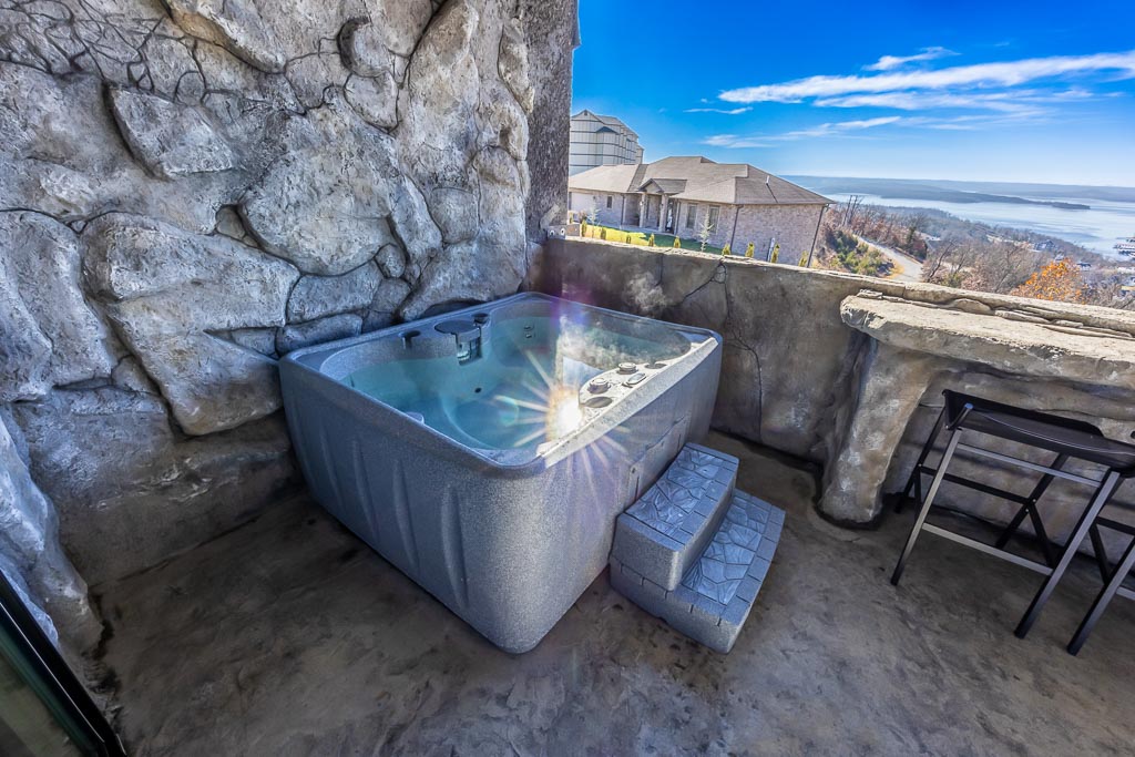 Cavern Suite at Grotto Resort, built into the natural stone hillside with a private veranda overlooking Table Rock Lake