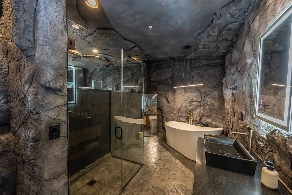 Cavern Suite at Grotto Resort, built into the natural stone hillside with a private veranda overlooking Table Rock Lake