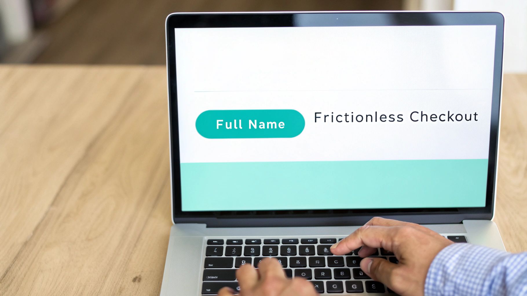 Person typing on laptop displaying frictionless checkout form with full name field on screen