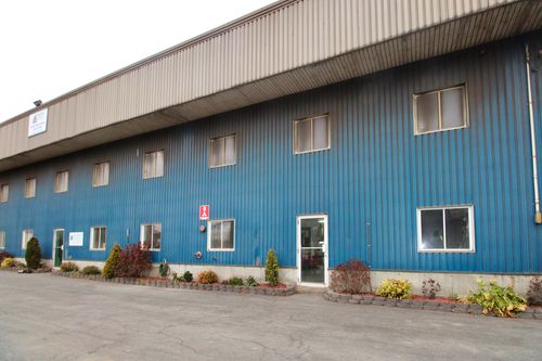 the back view of the three story commercial building.