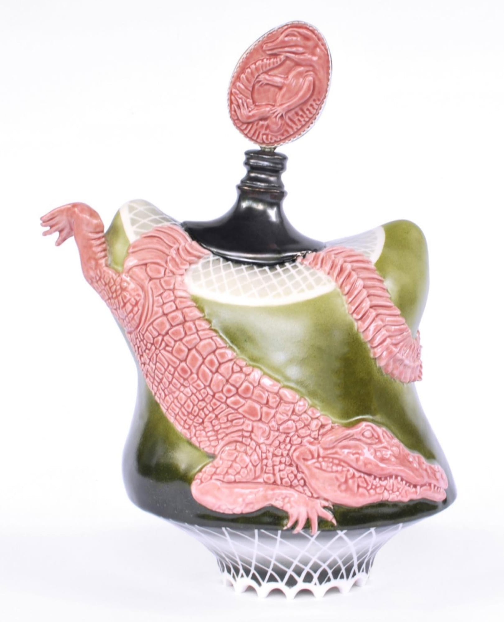 Isys Hennigar, N'en Parlons Plus (2023). Glazed porcelain, overglaze, nickel silver, sterling silver, 12 in x 8 in x 8 in.