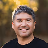 Headshot of Jose Garcia smiling outdoors