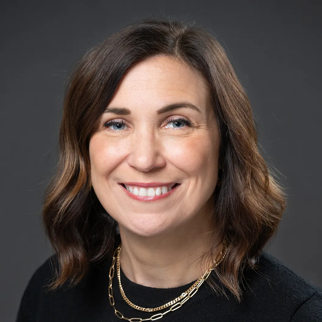 Headshot of Melissa Ardavany, Intentwise Director of Customer Success, wearing a layered necklace