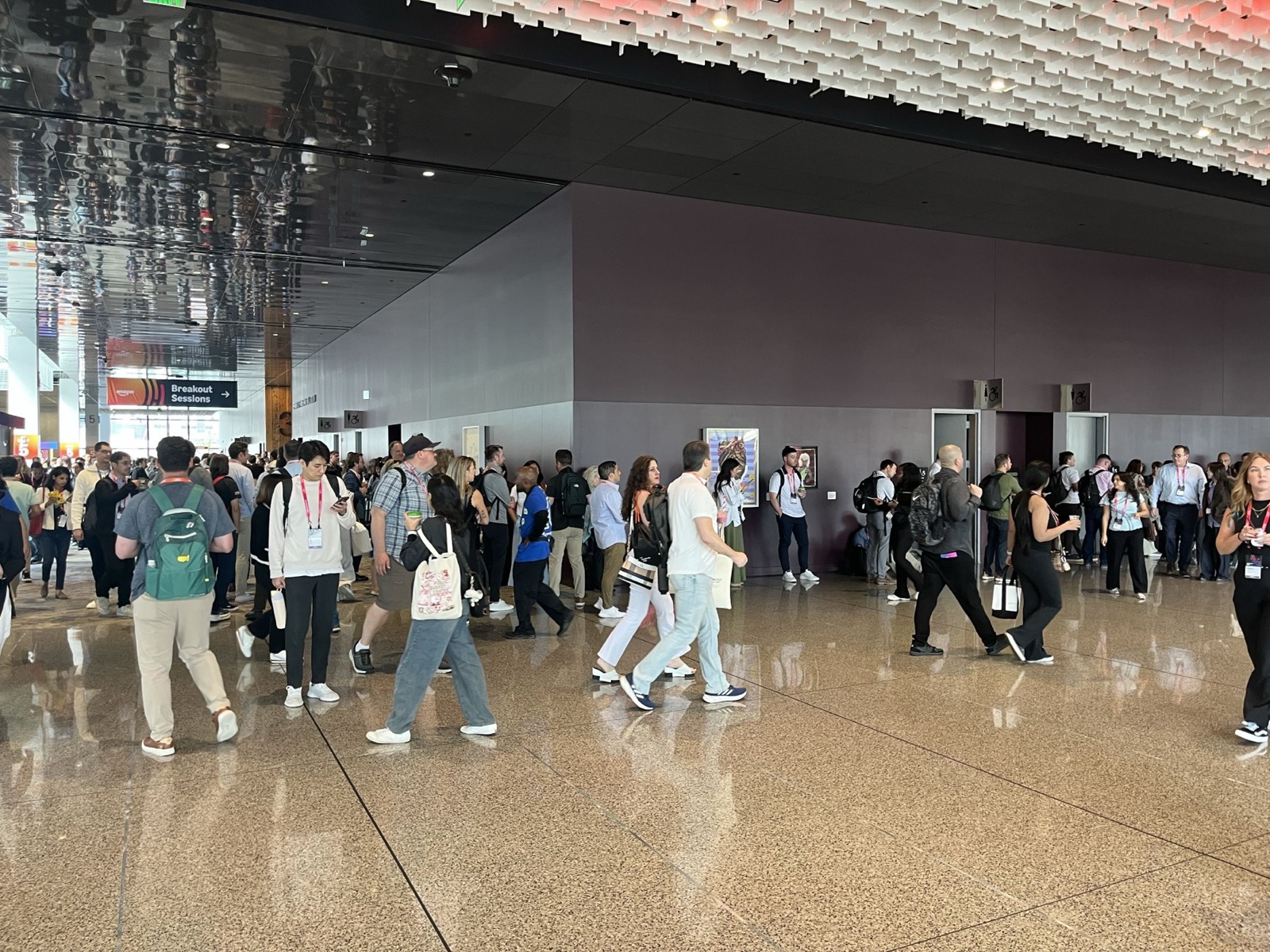 A crowded hallway outside the session rooms at Amazon Accelerate