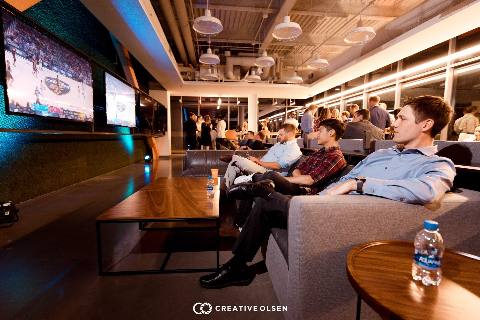 entrepreneurs collaborating in a comfortable Omaha lounge area - omaha small business coworking entrepreneurs collaborating in a comfortable Omaha lounge area - omaha small business coworking