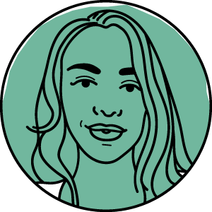 Jen Bolster has long straight hair and a soft smile.