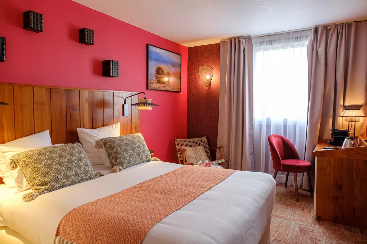 Chambre spacieuse avec décoration bohème unique et tout le confort moderne