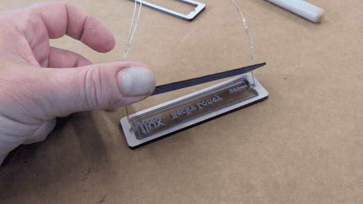 Gluing the back frame onto the front plate