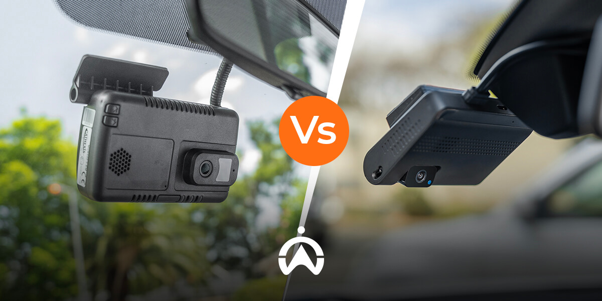 Two dashboard cameras mounted on car windshields, comparing designs side by side with a "Vs" icon in the center.