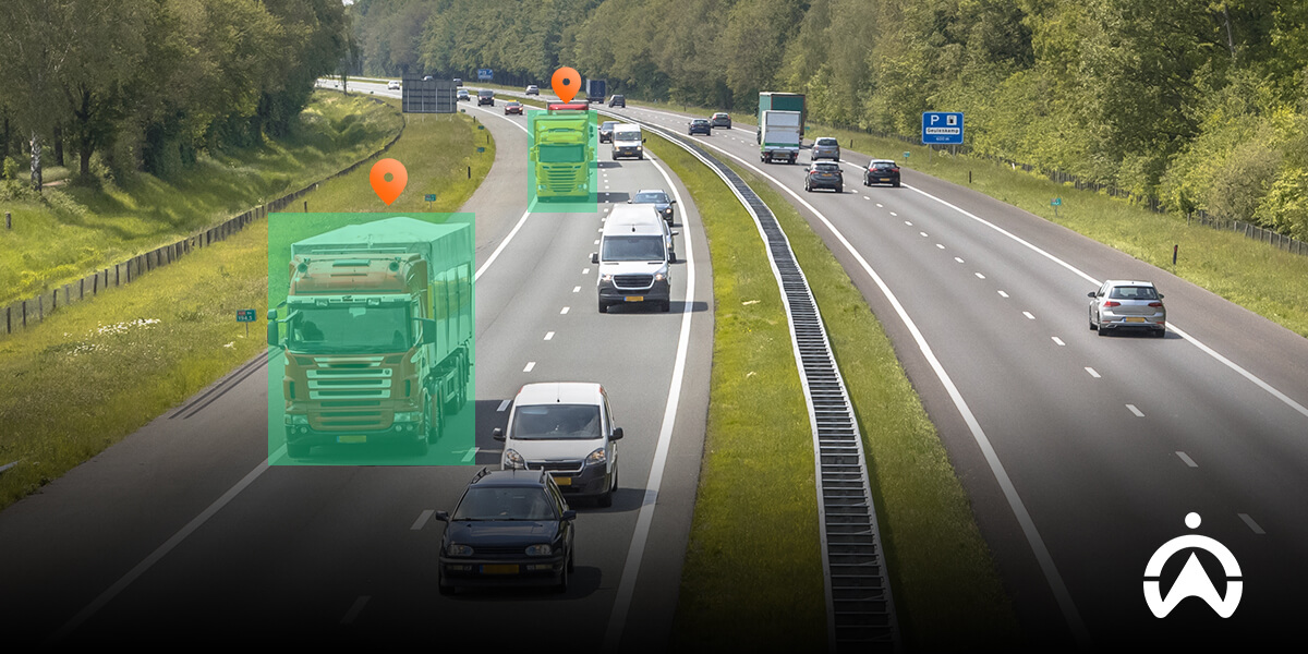 Highway traffic with vehicles highlighted demonstrating advantages of GPS technology.