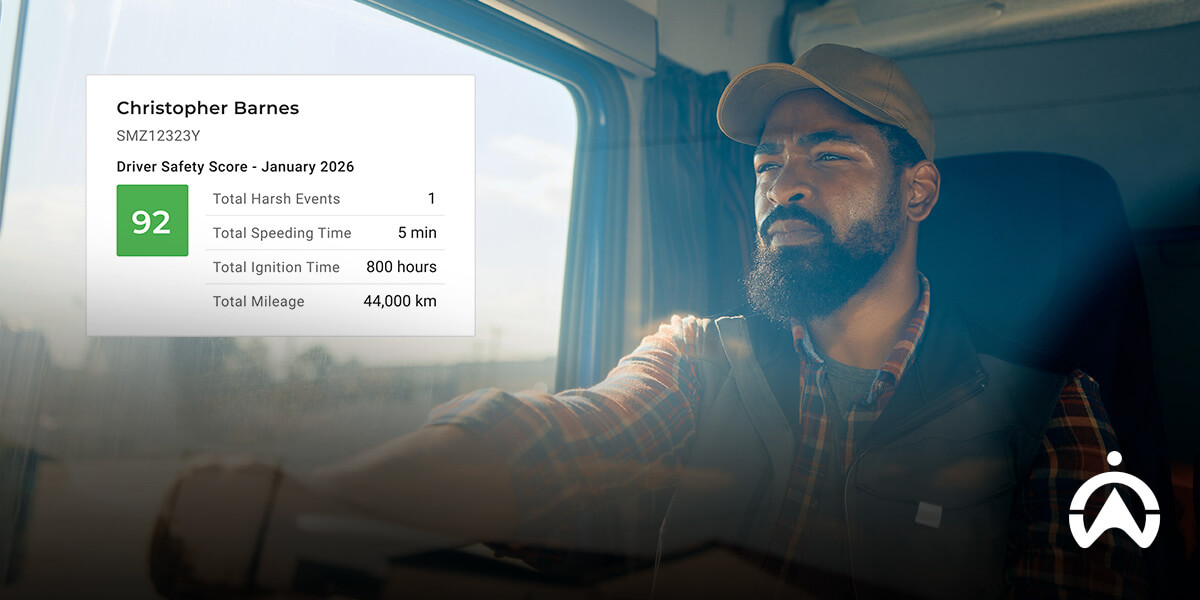 Driver viewing Cartrack safety score report on dashboard, supporting steps to become fleet safety certified.
