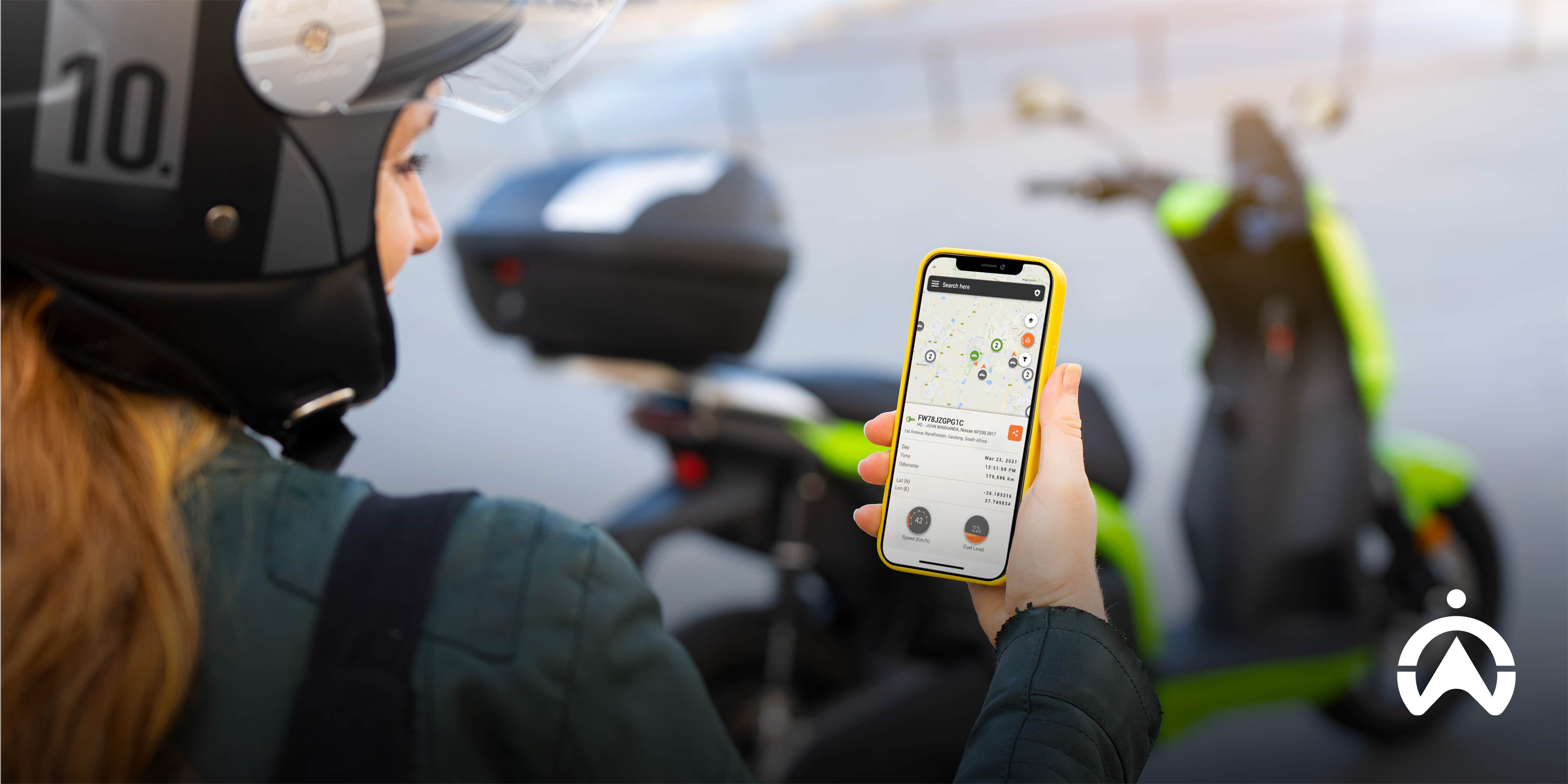 Rider using a Cartrack's Bike Tracker app with a motorcycle, comparing subscription vs no subscription tracking device options.