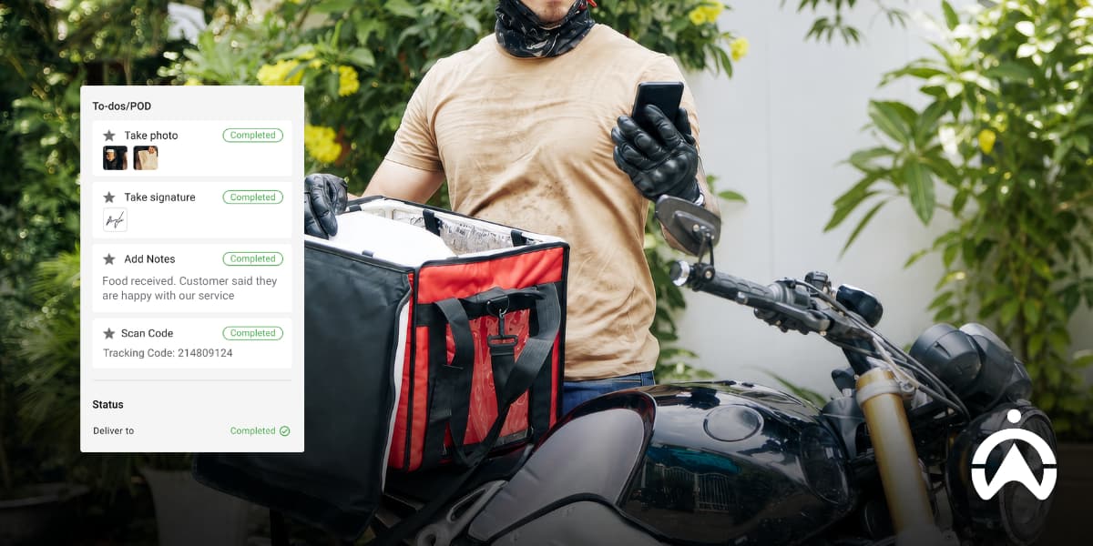 Delivery rider using Cartrack delivery management software to streamline restaurant deliveries and completed orders.
