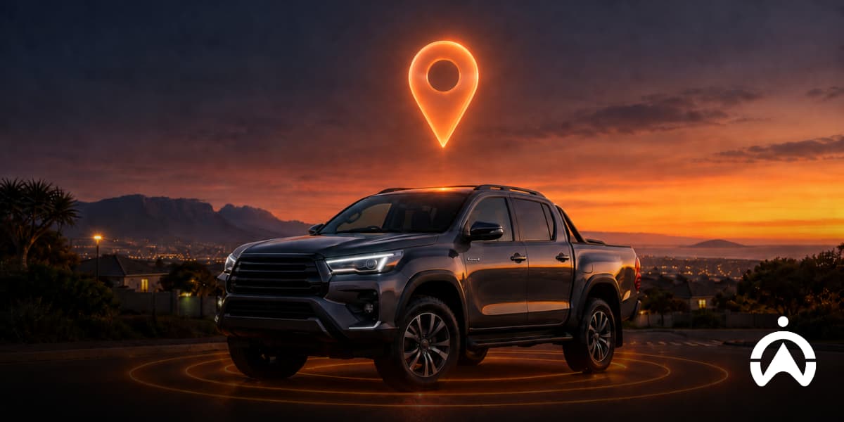 Dark pickup truck surrounded by GPS location graphics, illustrating vehicle tracking devices for high-risk vehicles and insurance security requirements.