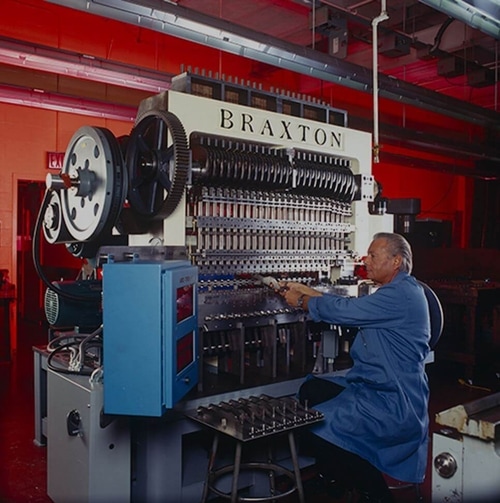 Braxton Nelson with a machine.