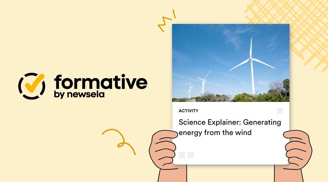 Science Explainer activity: Generating energy from the wind. The card shows large white wind turbines standing on a grassy hill against a bright blue sky.