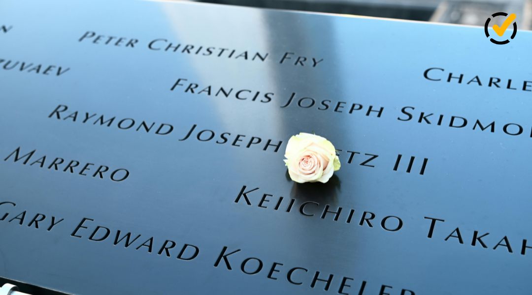 A white rose rests on engraved names at the 9/11 Memorial for 9/11 classroom activities.