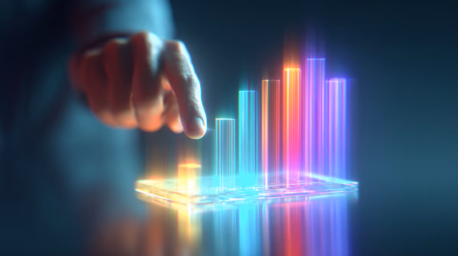 Hand interacting with a colorful glowing 3D bar chart hologram projecting from a transparent device.