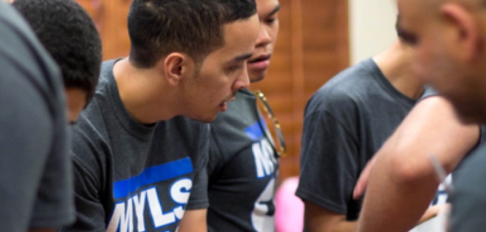 A group standing representing the Islamic Community