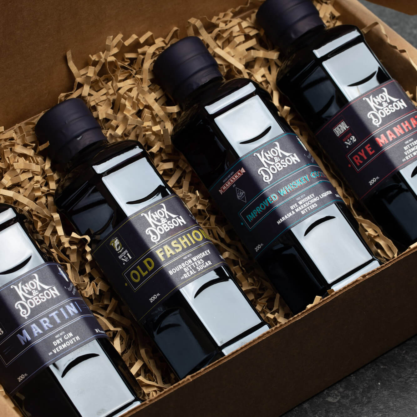 Knox and Dobson bottles in box showing beautifully designed labels