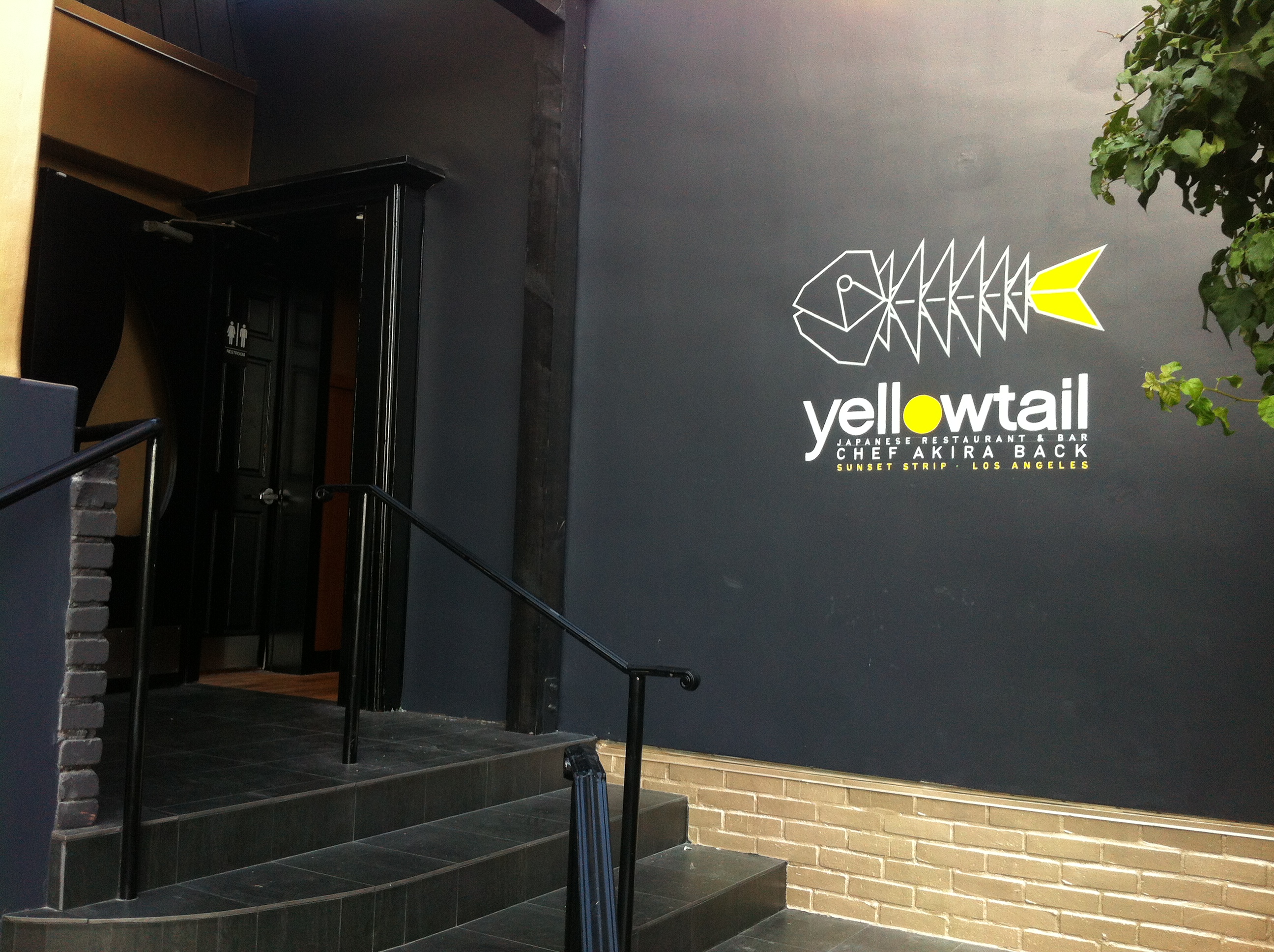 Fabricated background for Bulleit event. Corigated steel and lit up text 