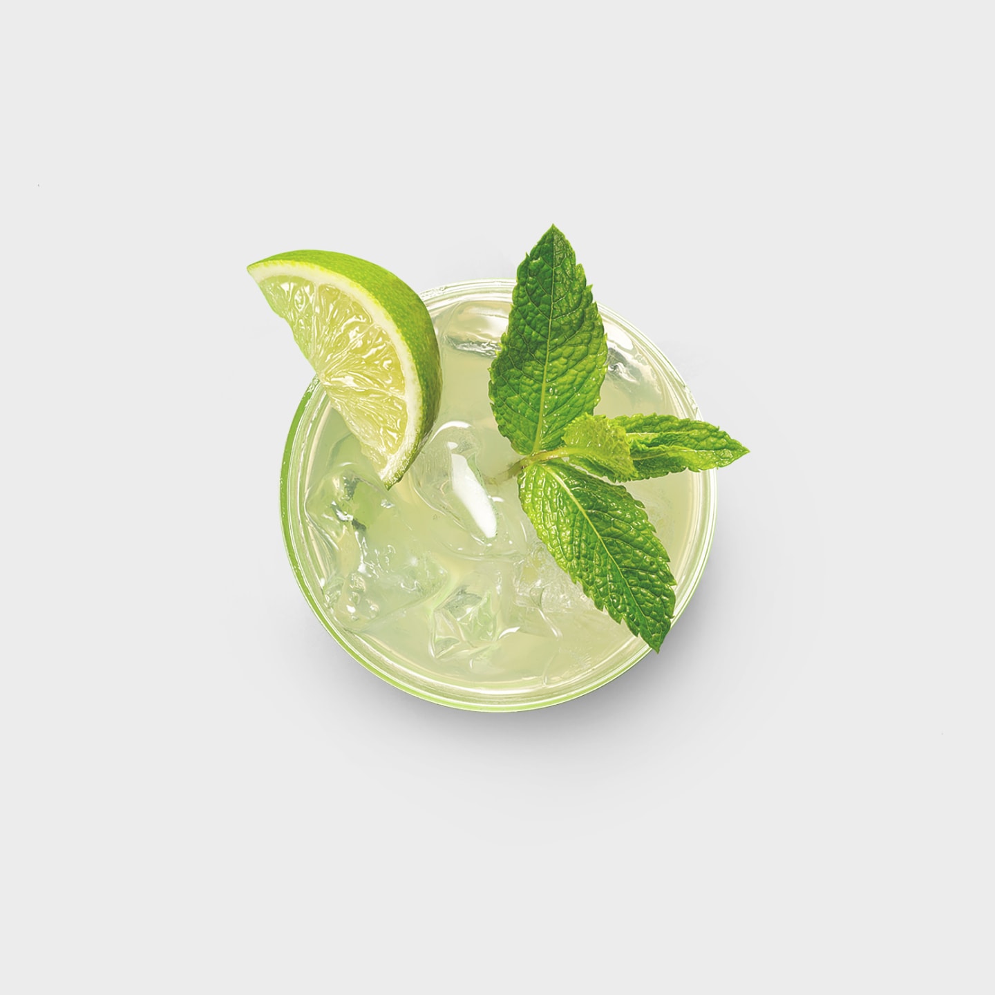 Glass of a cocktail with fresh mint