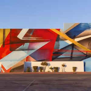 Large abstract mural on the outside of a building
