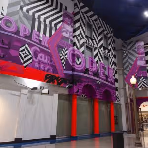 Black, red, and purple graffiti-style mural