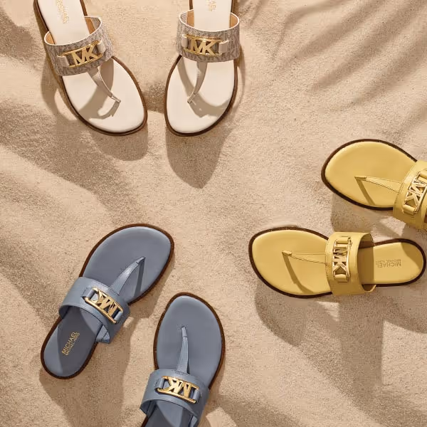 michael kors flip flop sandals on fabric in tan, smoky blue and light yellow. 