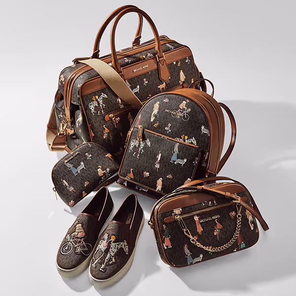 backpack two small purses and pair of sneakers with michael kors logo and their country print 