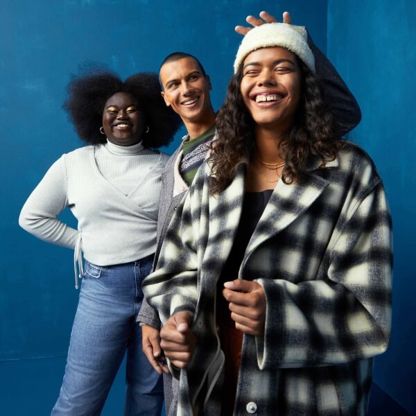 Group of young adults wearing Levi's long-sleeved styles