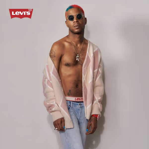 Model wearing Levi's Jeans and sweater