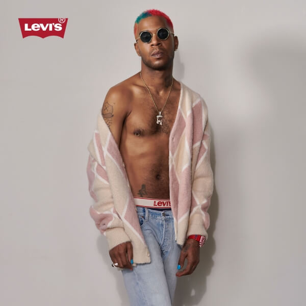 Model wearing Levi's Jeans and sweater