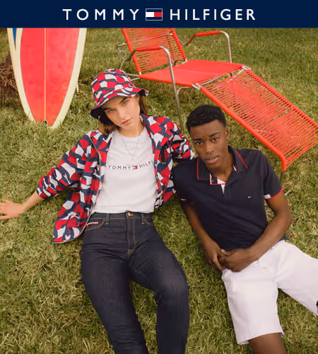 Two models wearing various red, white, and blue Tommy Hilfiger summer styles