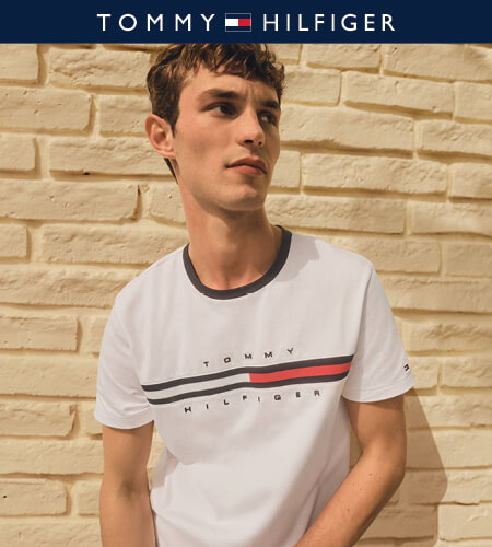 Model wearing classic white Tommy Hilfiger t-shirt