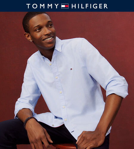 Model wearing long-sleeve Tommy Hilfiger button-up shirt